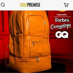Sole Premise Men’s Bold Brown Leather Backpack with Multiple Zip Compartments